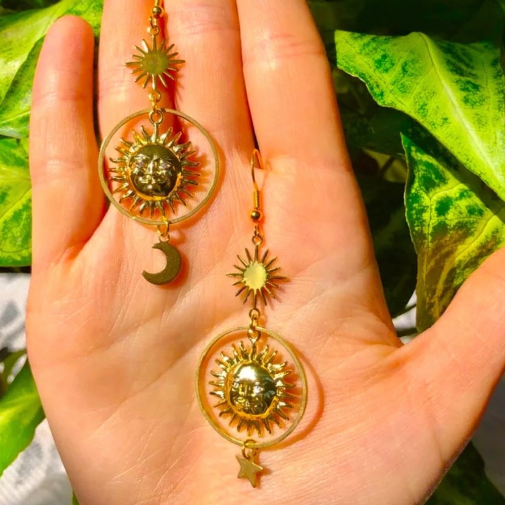 Celestial Sun and Moon mismatch earrings.